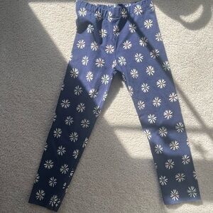 Primary pants, barely worn. Rainbow flower pattern on navy.